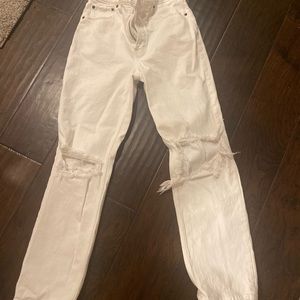 Abercrombie white destroyed jeans.